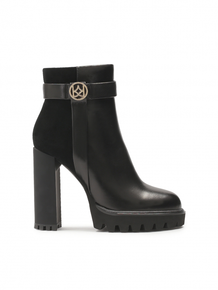 High stiletto boots in suede and smooth leather