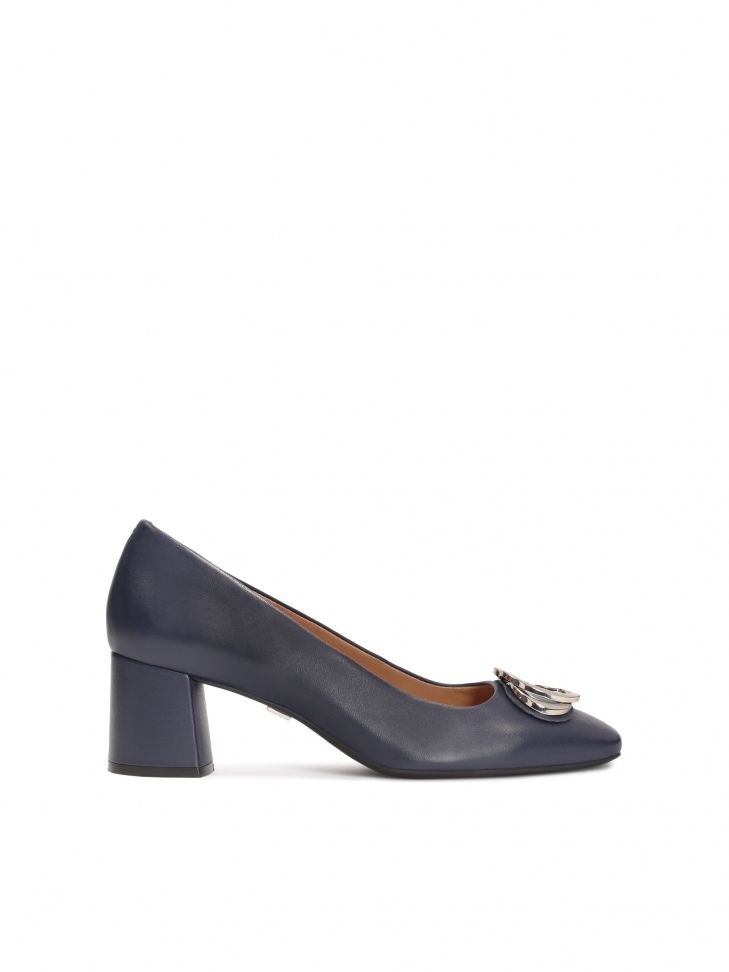 Navy blue leather pumps with metal embellishments