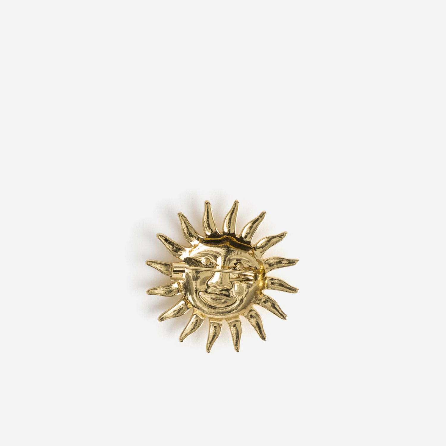 Broche jaune métal forme soleil