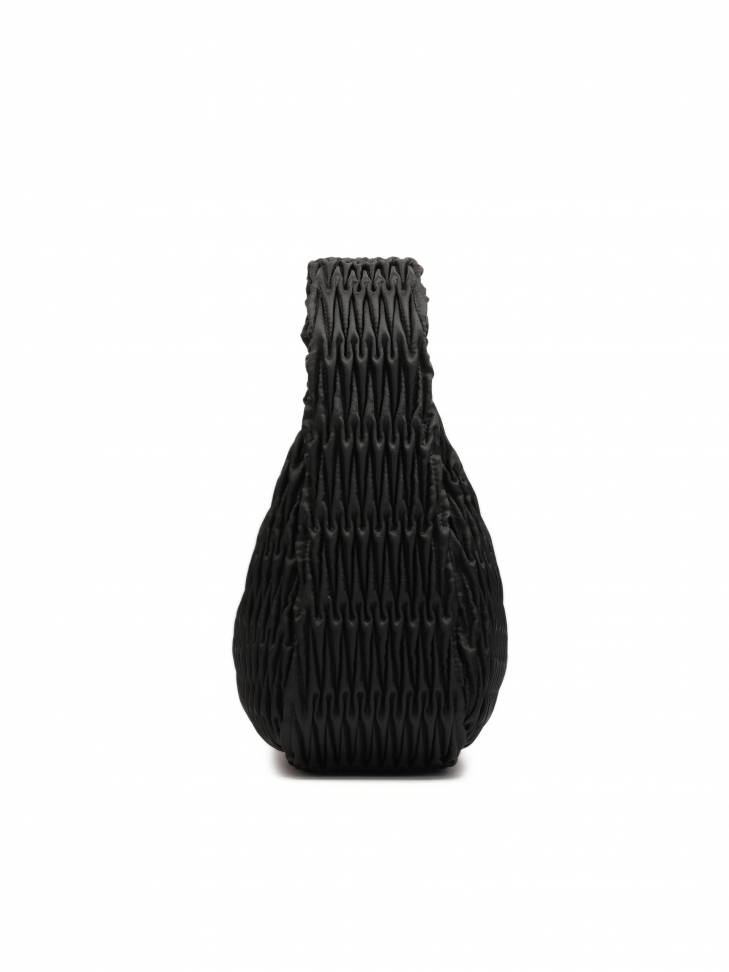 Shoulder bag in strikingly decorated fabric