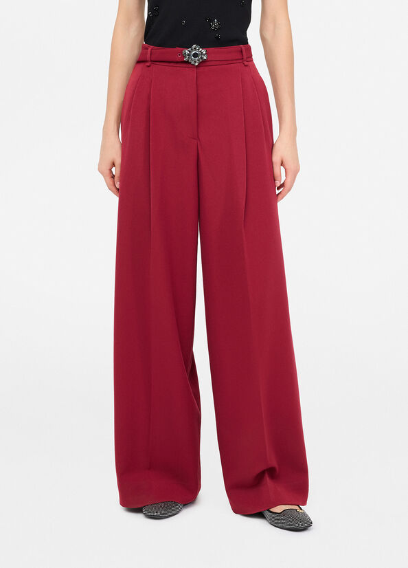 Pantaloni palazzo con cintura gioiello