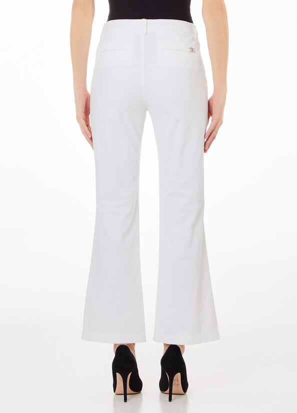 Pantaloni chino flare in velluto