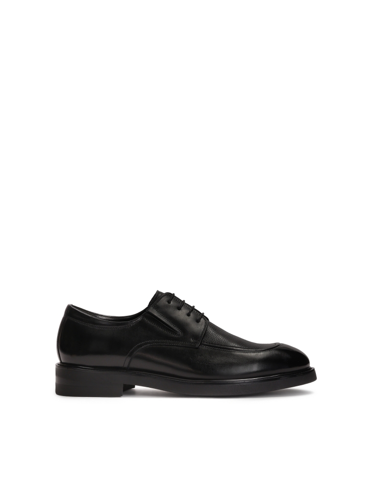 Black shoes with decorative stitching