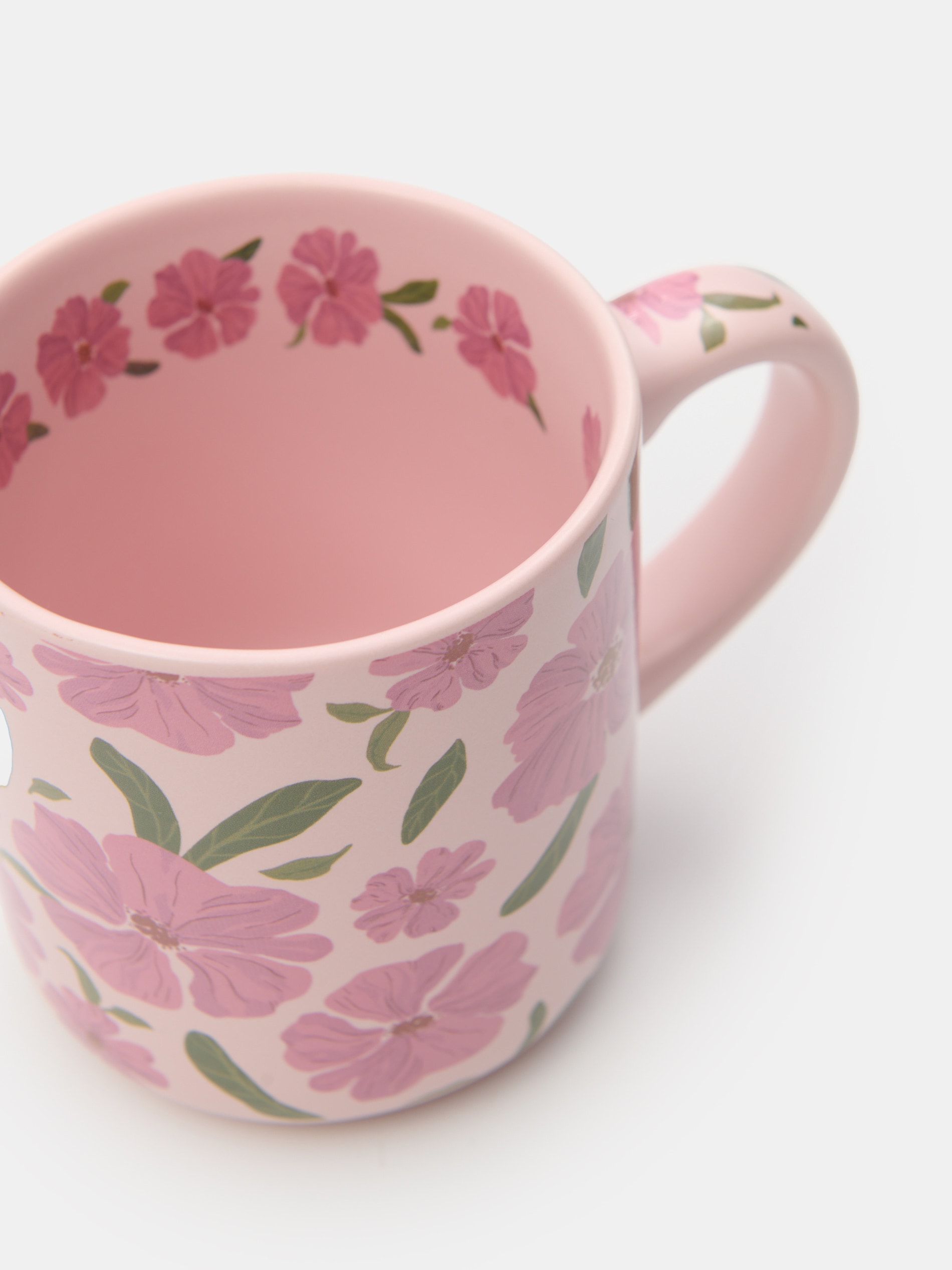 Ceramiczny kubek z motywem kwiatowym
