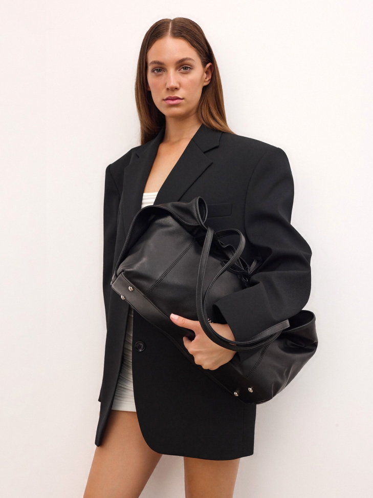 Leather handbag with removable insert