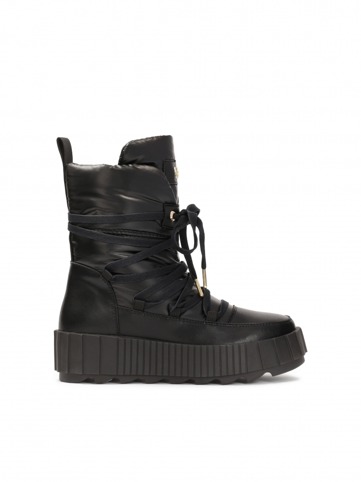 Black women's snow boots on a thick sole
