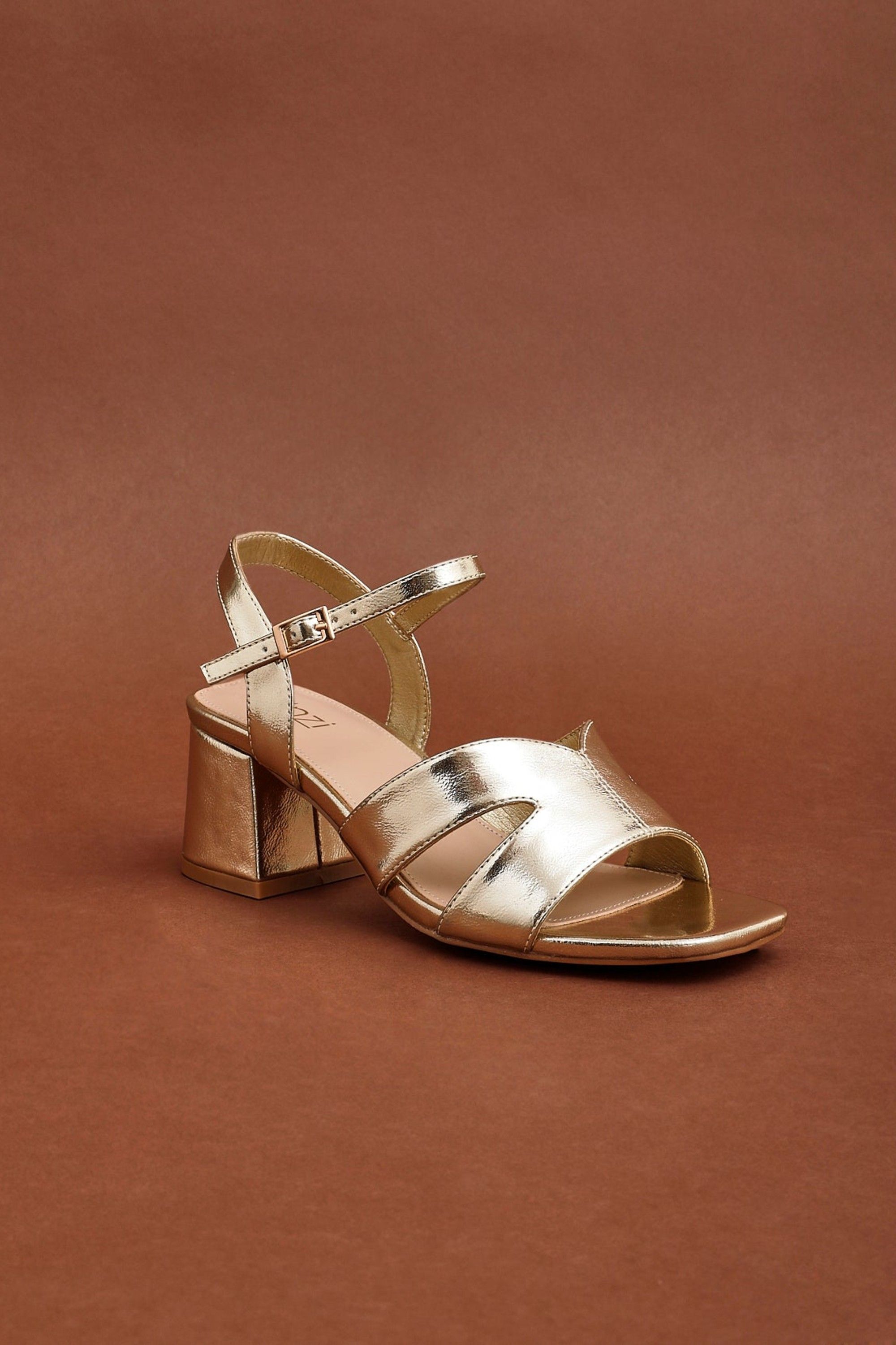 Linzi Empire Wide Fit Gold Faux Leather Link Detail Block Heels
