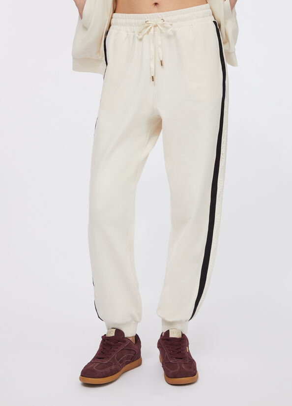 Pantaloni jogging in felpa con pizzo