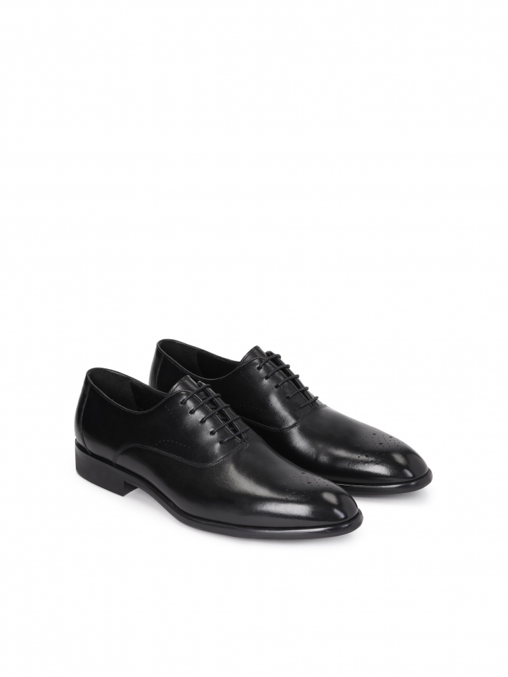 Men’s black oxfords with decorated toes