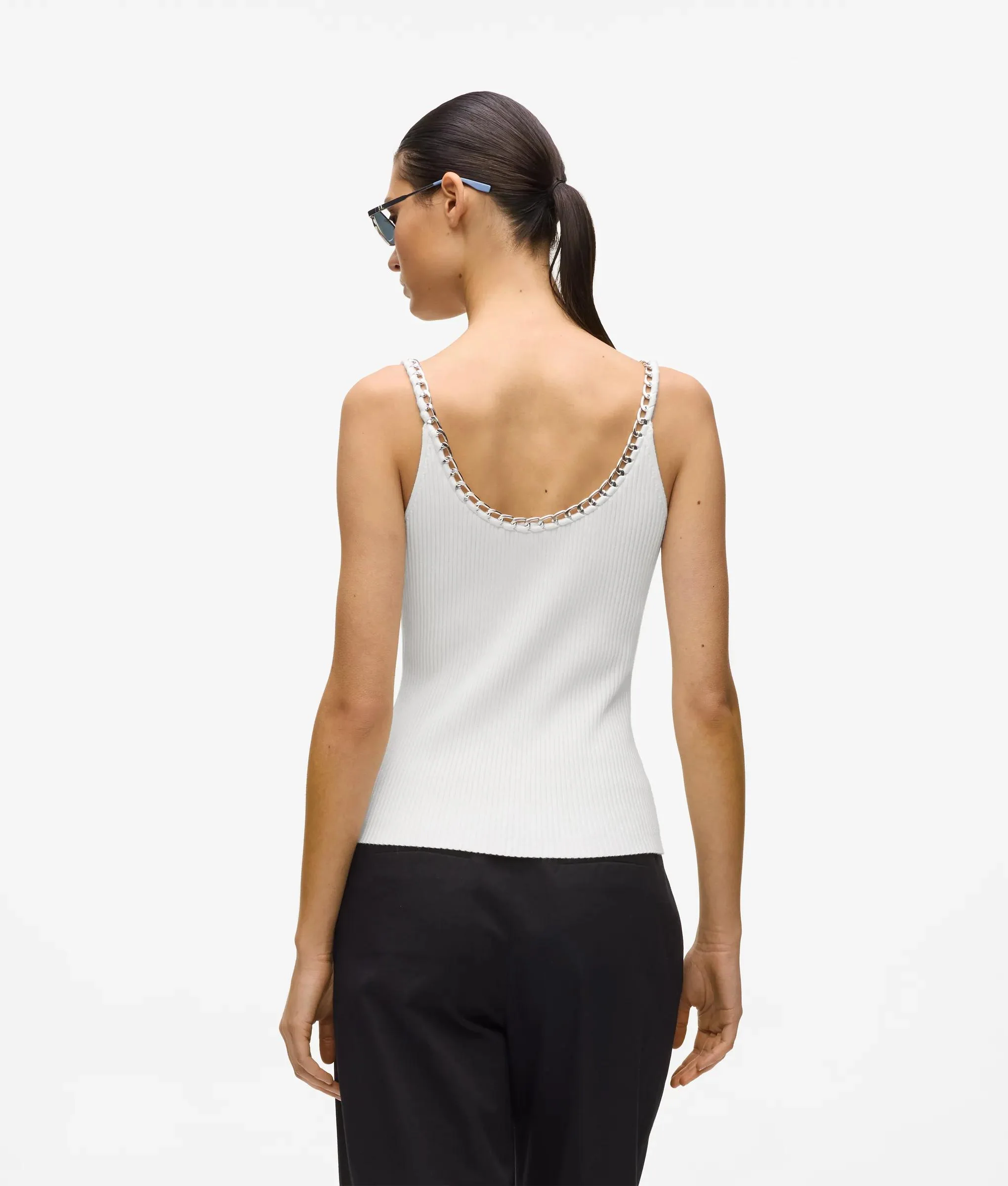 Haut en maille avec détail chaîne