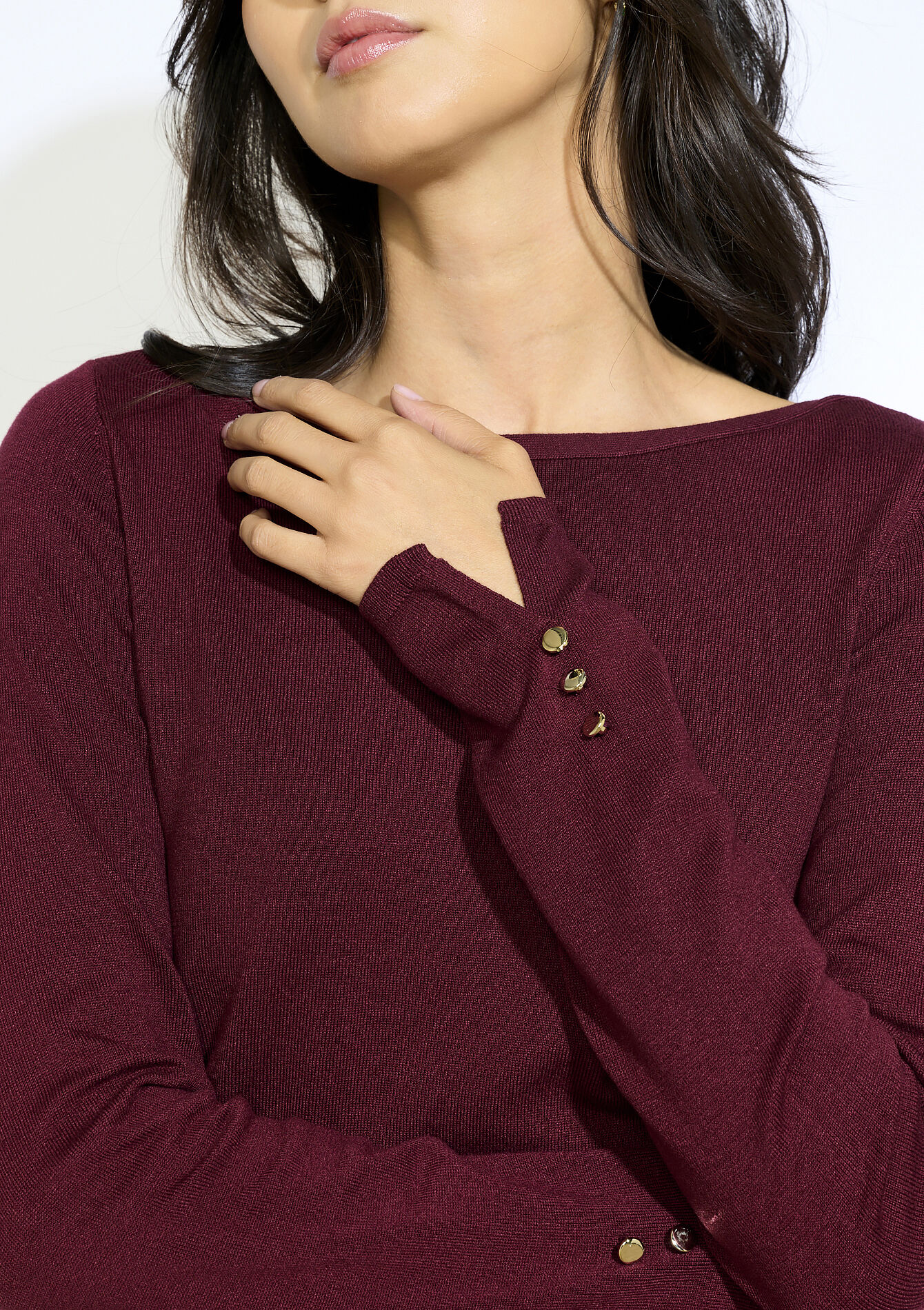 Trui met gouden knopen