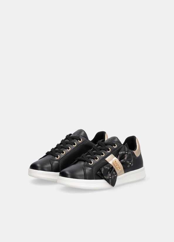 Sneakers con maxi fiocco