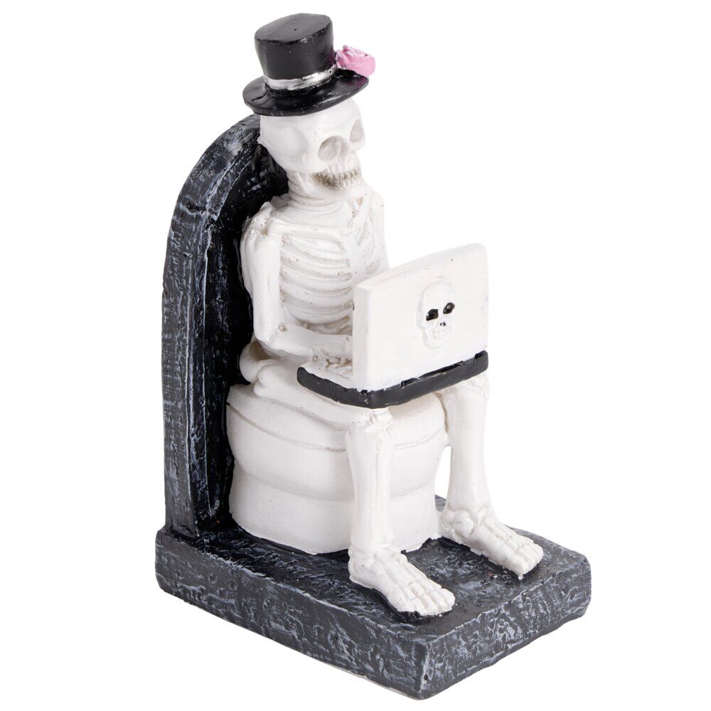 Décoration Halloween squelette sur WC résine noir et blanc 6x8xH13cm