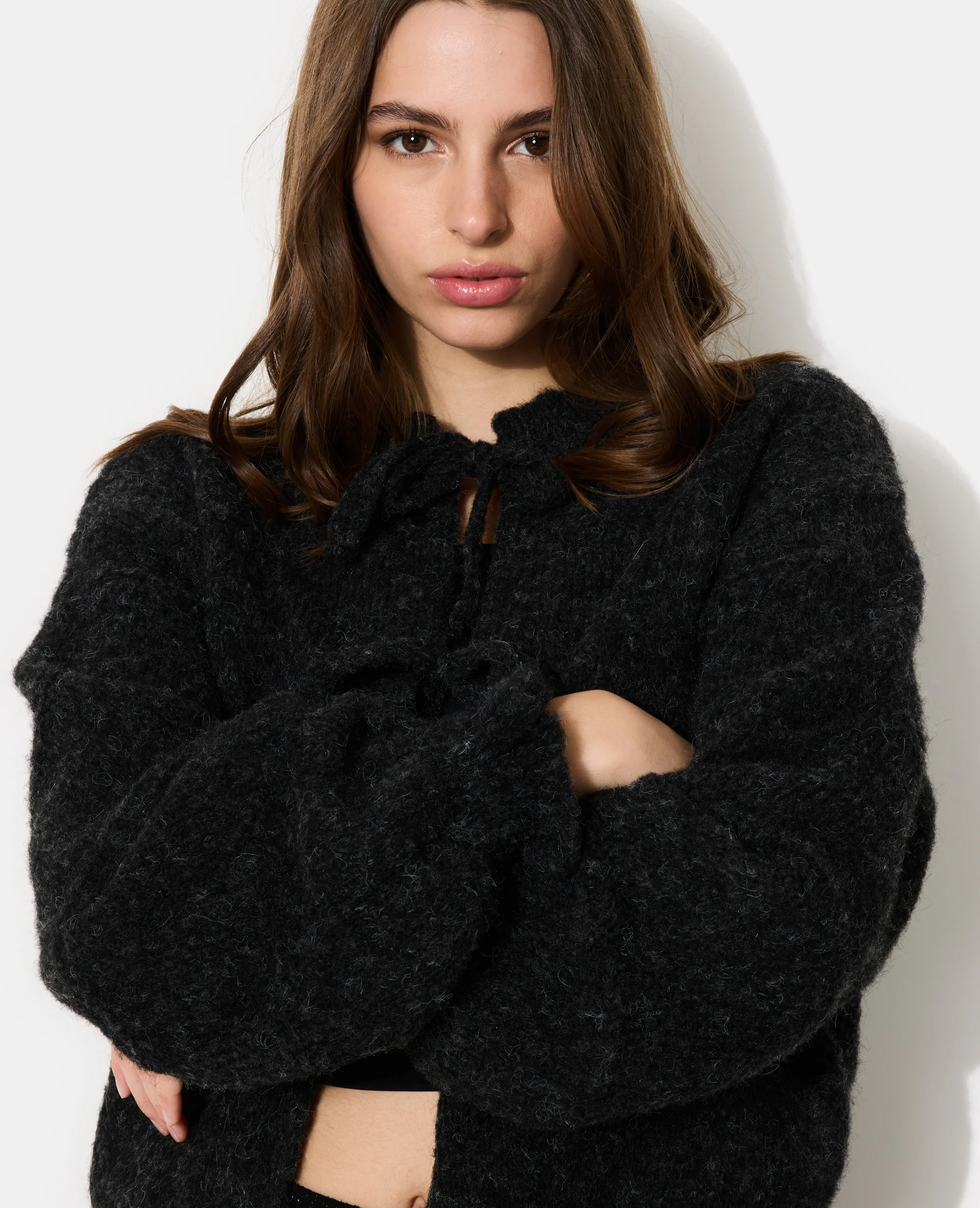 Gilet en maille fantaisie avec nouettes et volants