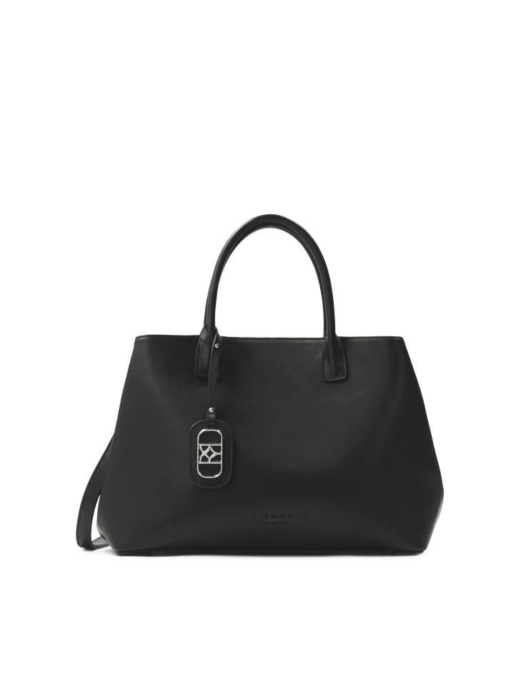 Black leather handbag in minimal style
