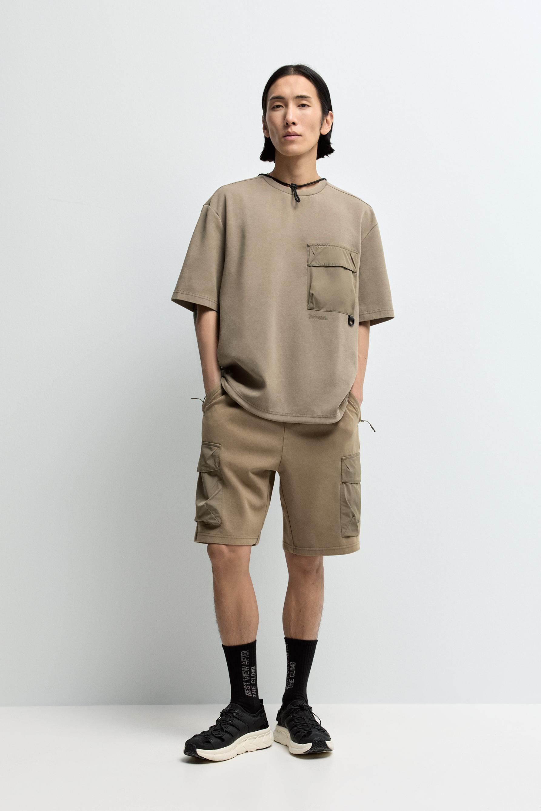 Camiseta interlock outdoor bolsillo anilla