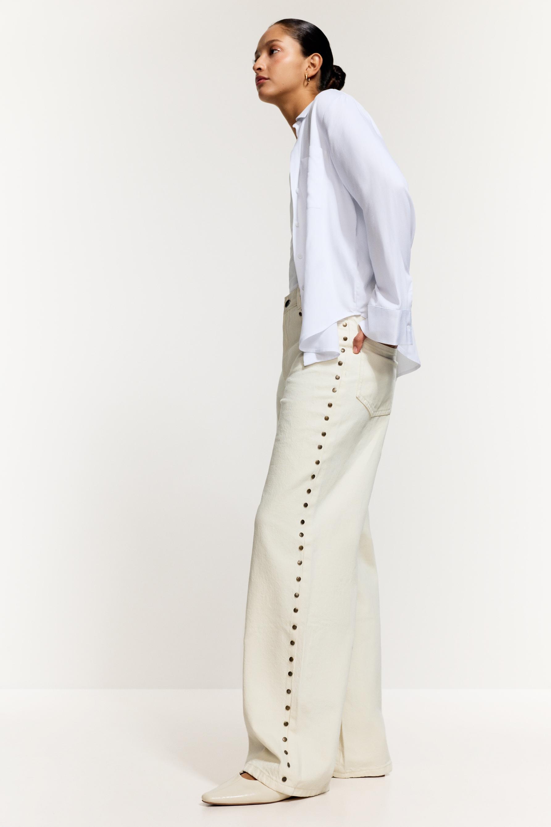 Jeans baggy tachas