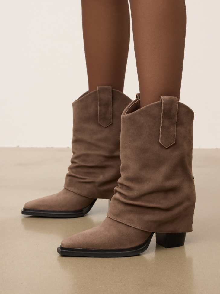 Light brown suede cowboy boots with decorative zipper