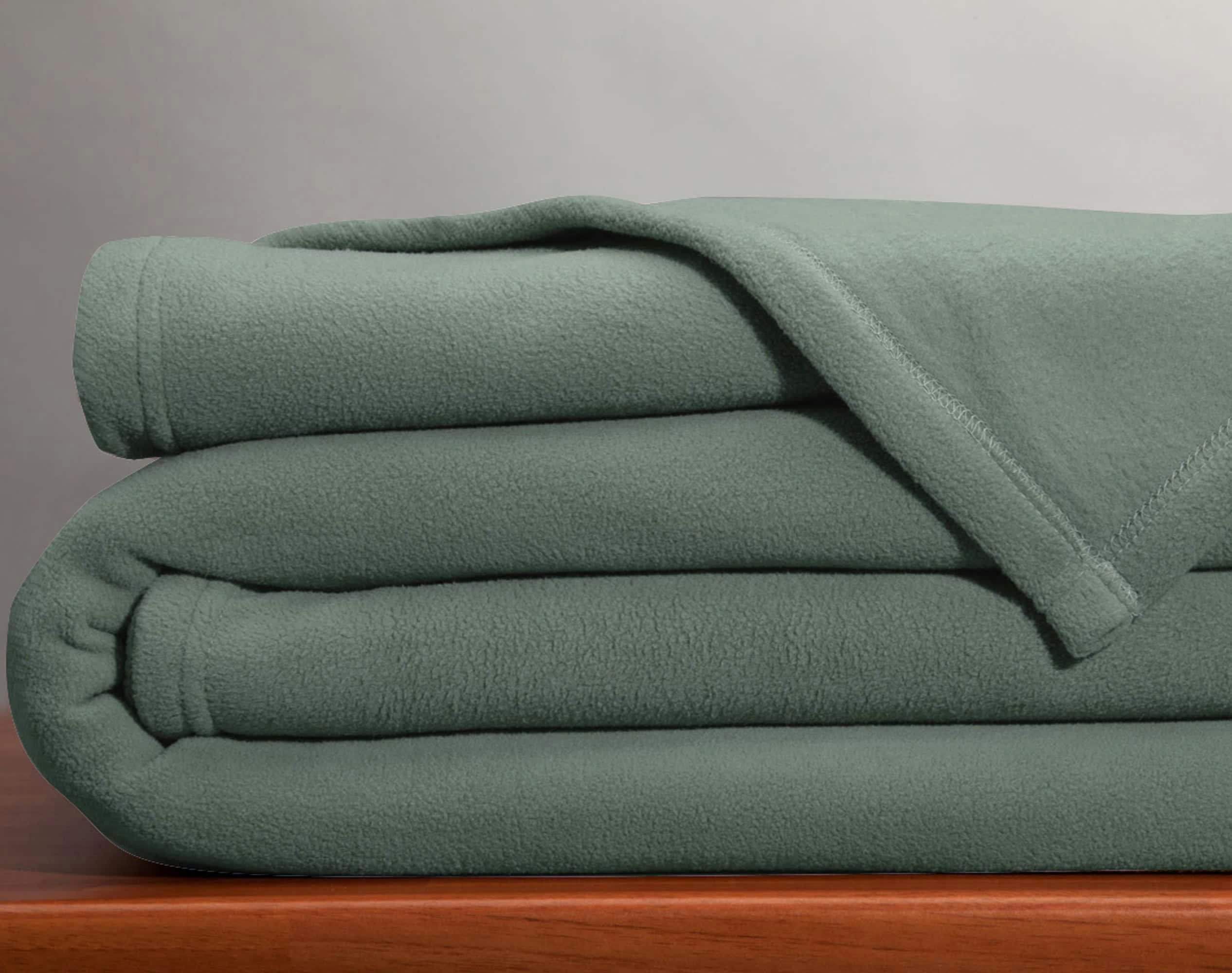 POLARIA - Couverture polaire 75x100 vert en microfibre 350g/m²