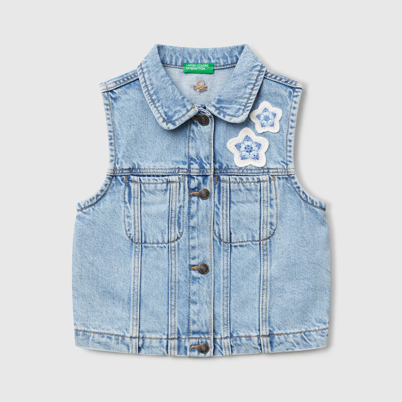 Denim vest with flower patch