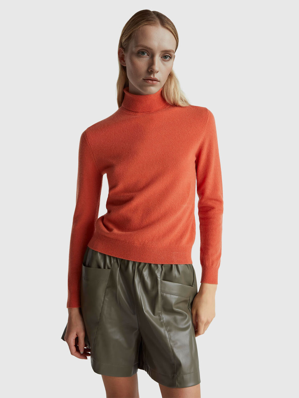 Orange turtleneck sweater in pure Merino wool