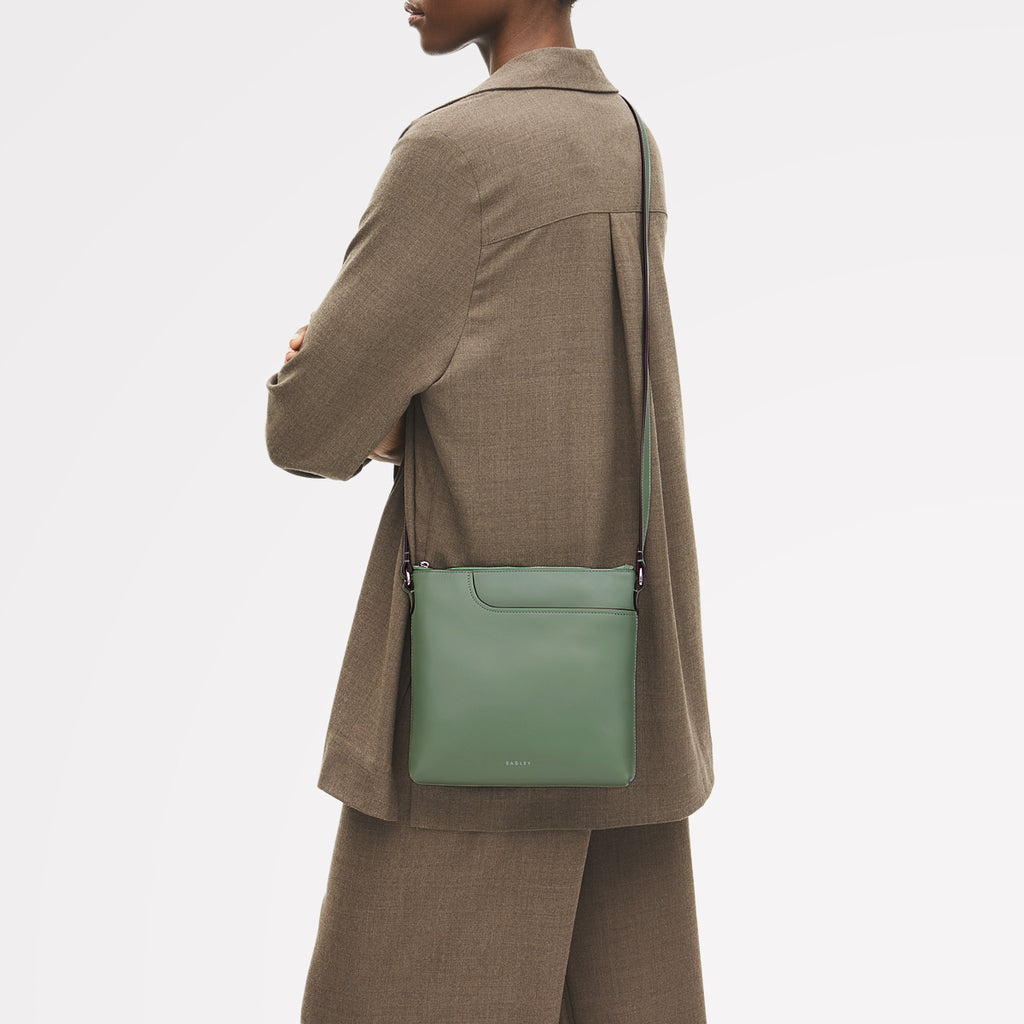 Pockets - Small Ziptop North-South Cross Body Bag
