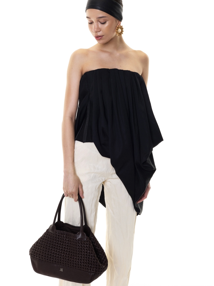 Handbag in a braided pattern with a loose fit