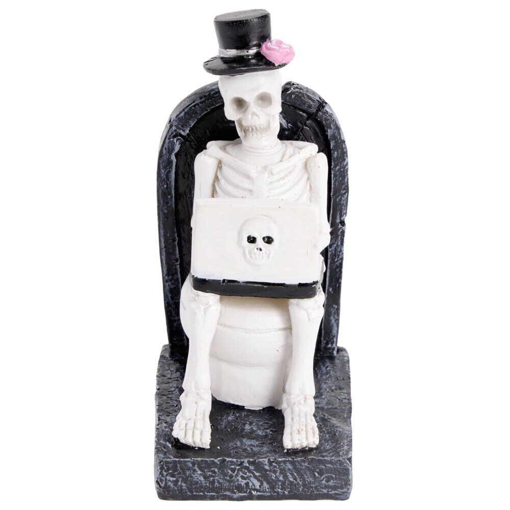 Décoration Halloween squelette sur WC résine noir et blanc 6x8xH13cm