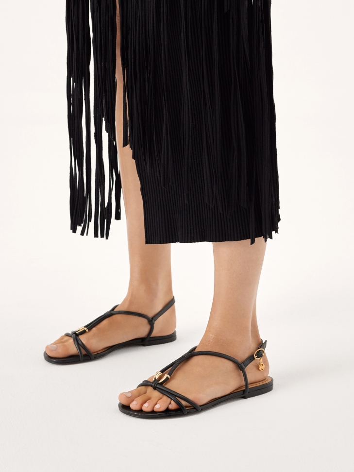 Black leather sandals with jewelry embellishment