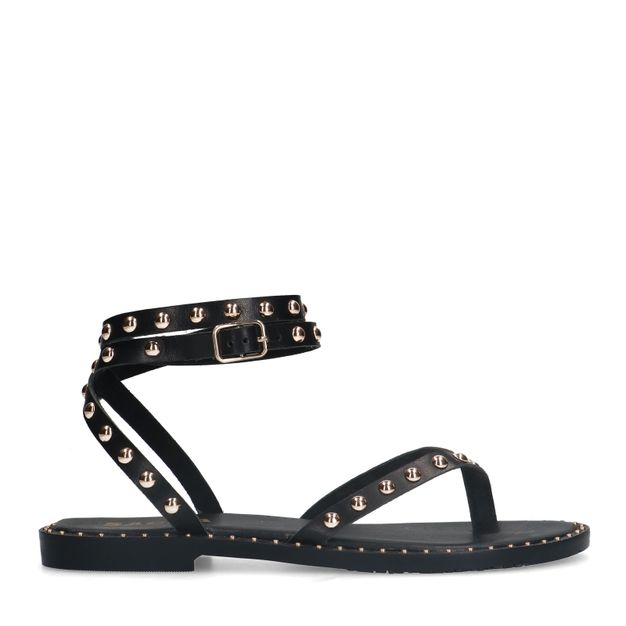 Zwarte leren platte sandalen met goudkleurige studs