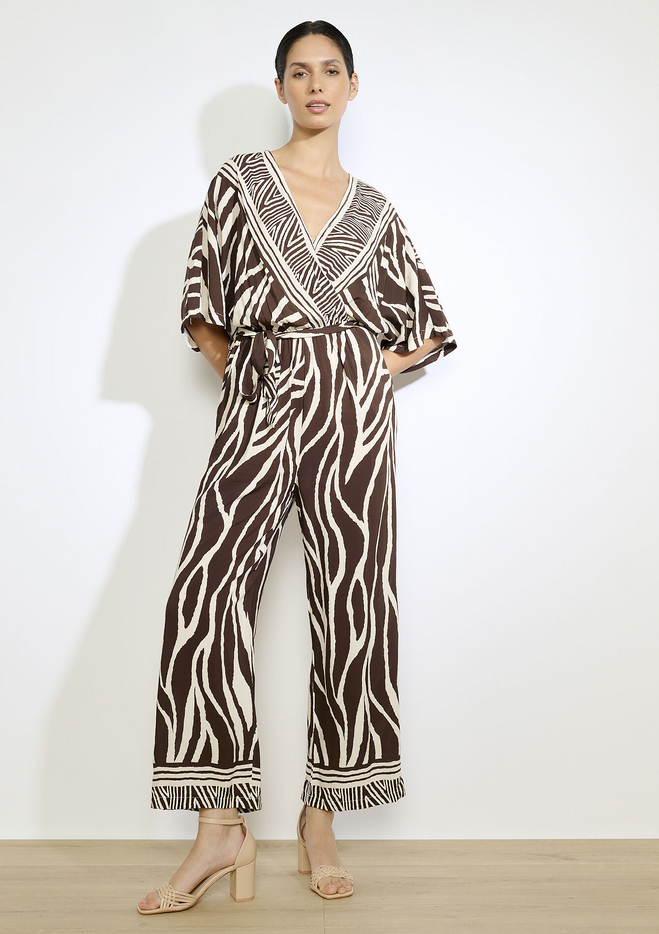 Wikkel jumpsuit met grafische print