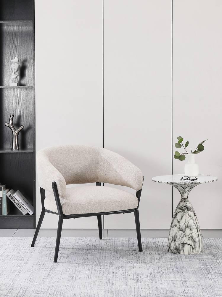 Fauteuil Savas bouclé
