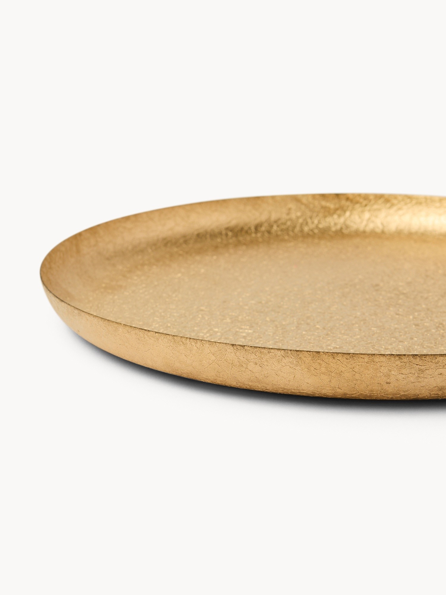 Vassoio decorativo in metallo dorato