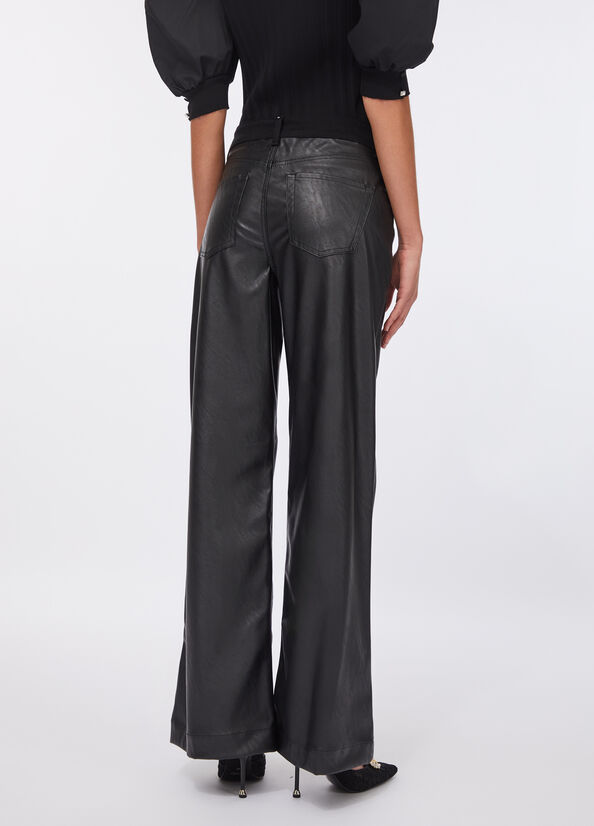 Pantaloni flare in tessuto spalmato