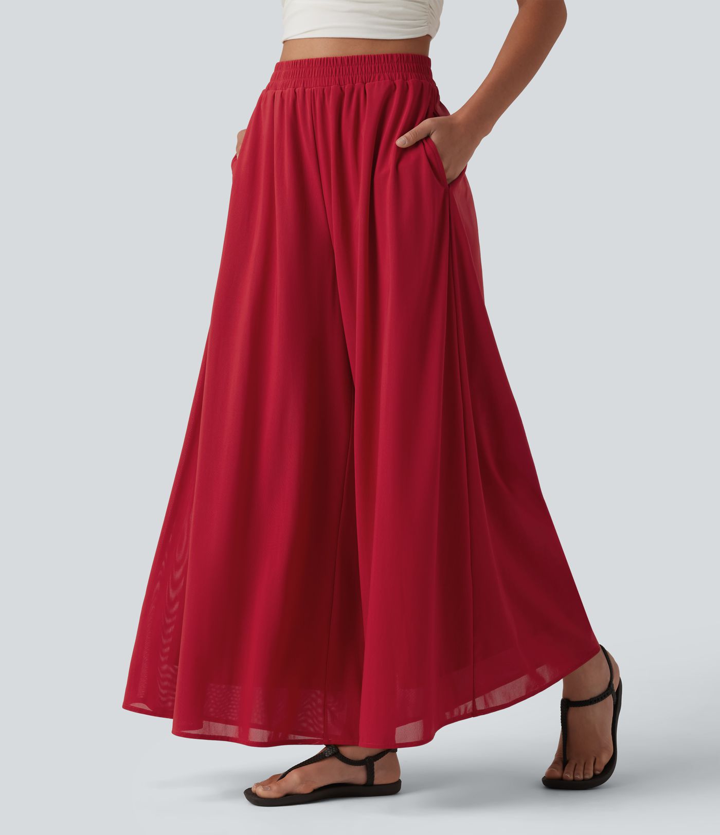 Pantalon fluide et ample avec superposition en mesh, poches latérales et taille haute