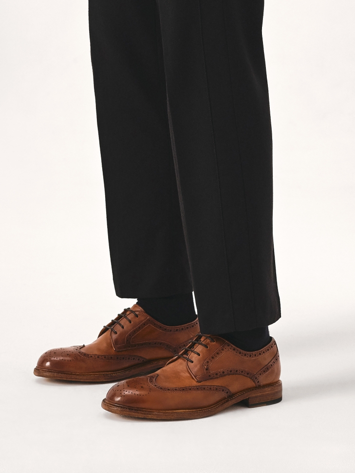 Brown shoes with openwork embellishment Limited Collection