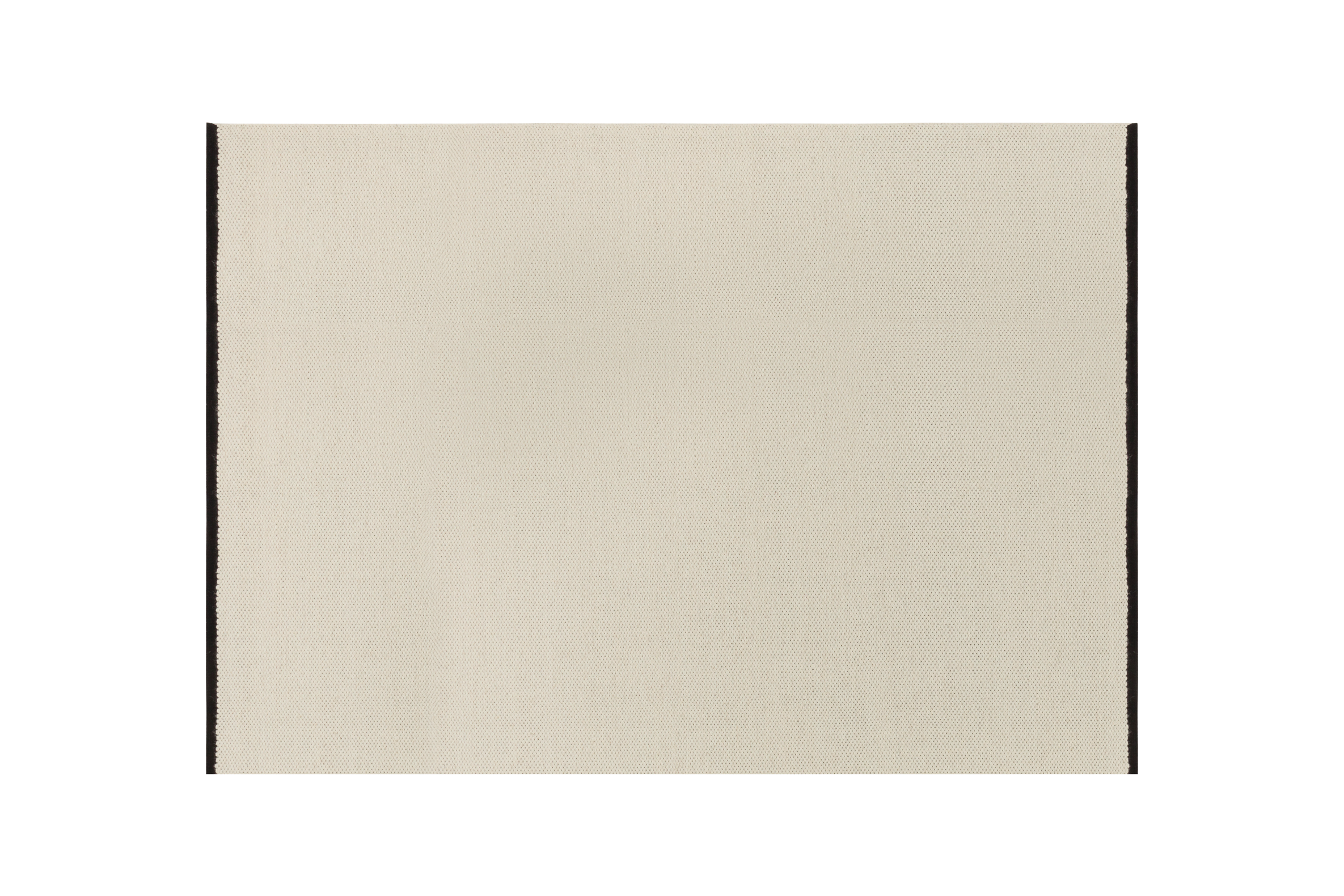 noo.ma handgeweven vloerkleed van Nieuw-Zeelandse wol, beige met Vulcano Black randaccent - rechthoekig, laagpolig 1 cm