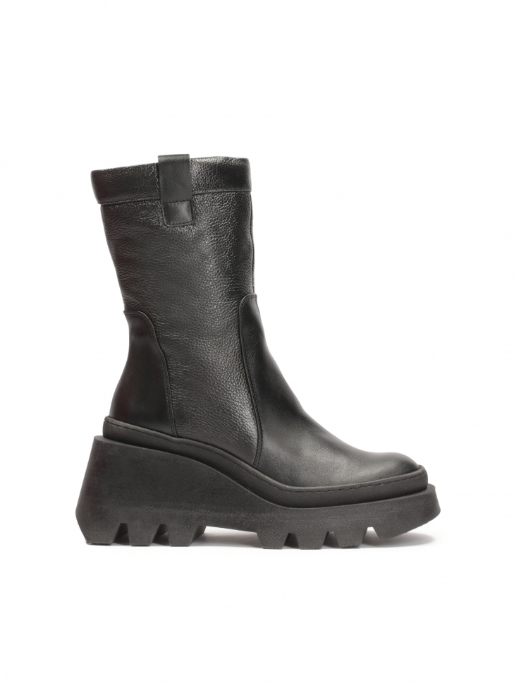 Zippered boots set on an anchor boot