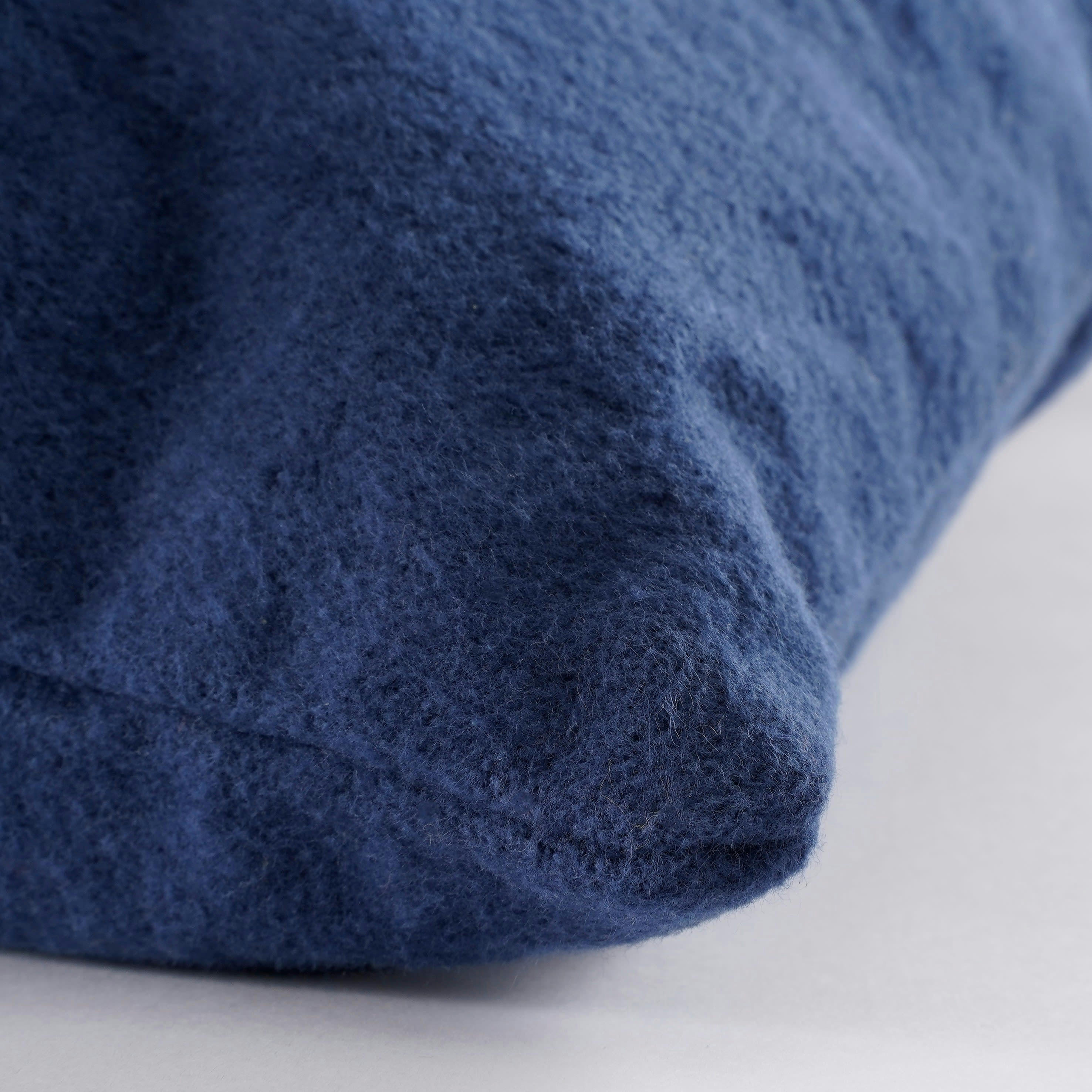 BERING - Coussin en coton bleu foncé 55x35