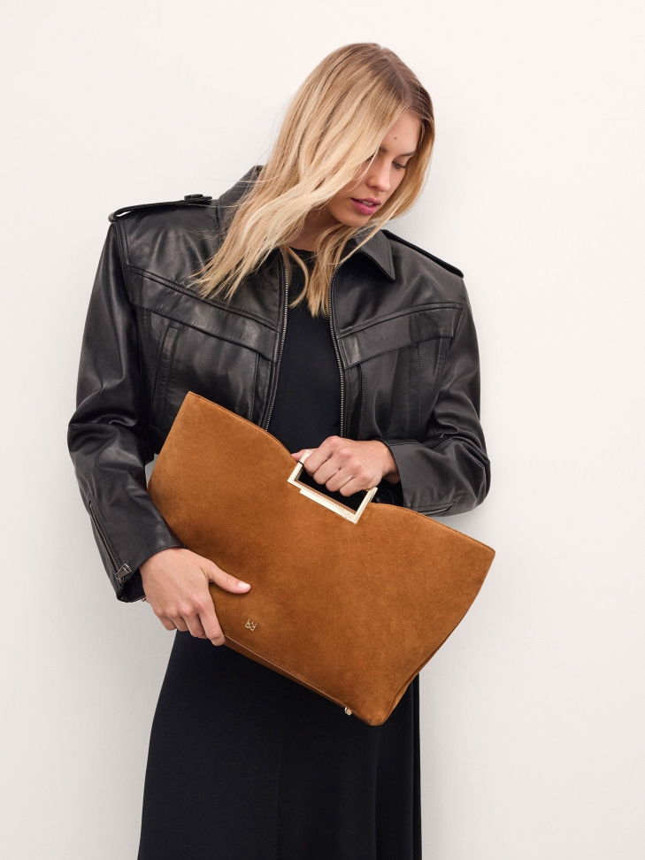 Suede handbag with metal handles