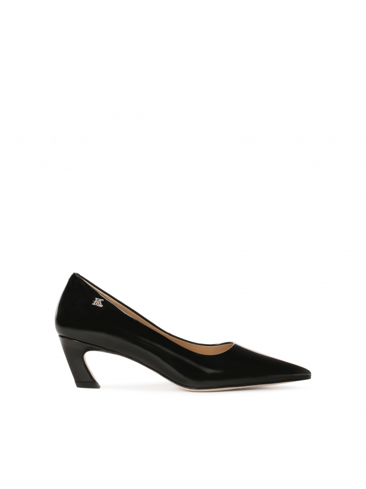 Black pointed-toe pumps with a slanted heel