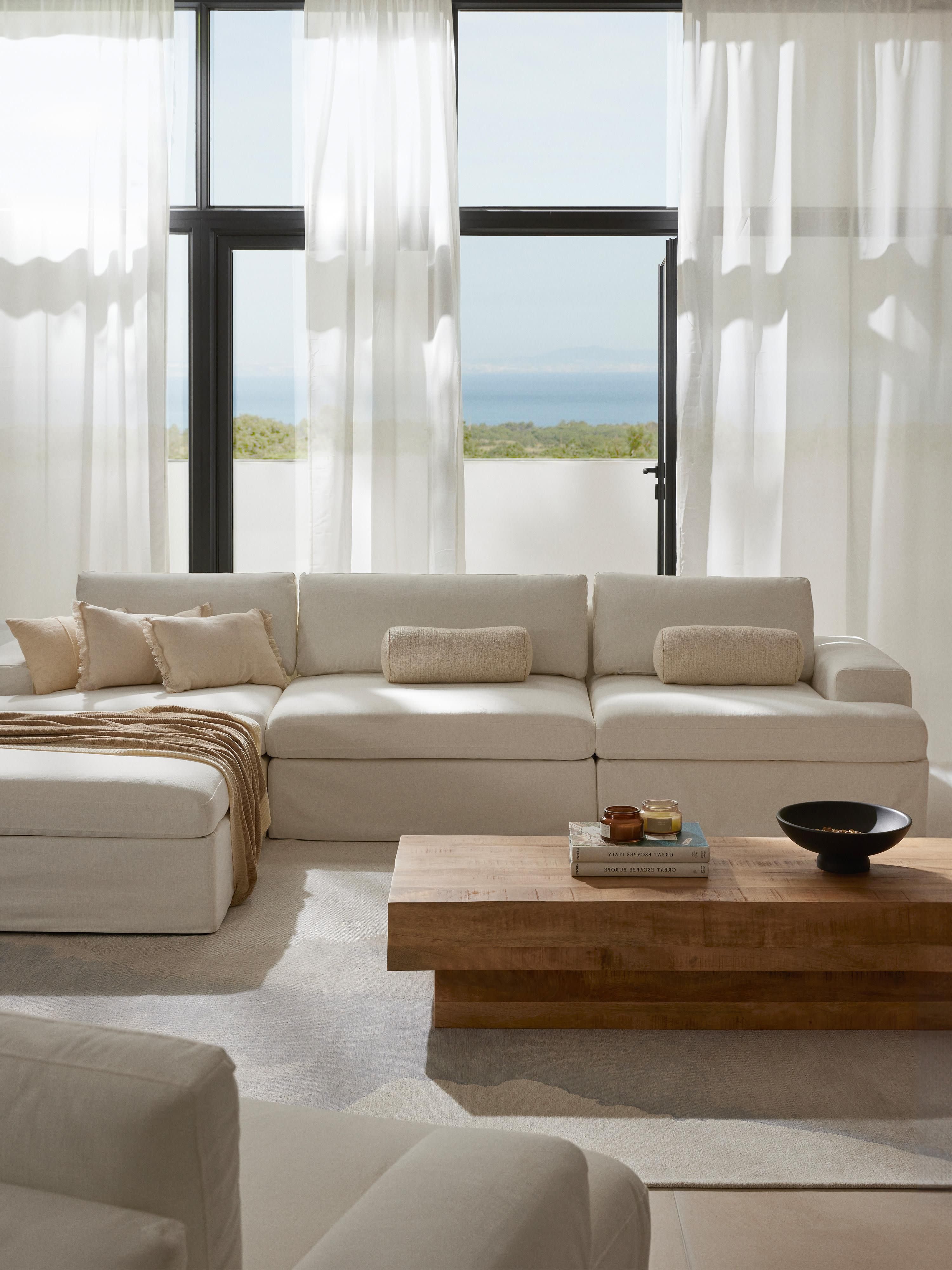 Modulares Sofa Russell (4-Sitzer) mit Hocker (links/rechts)
