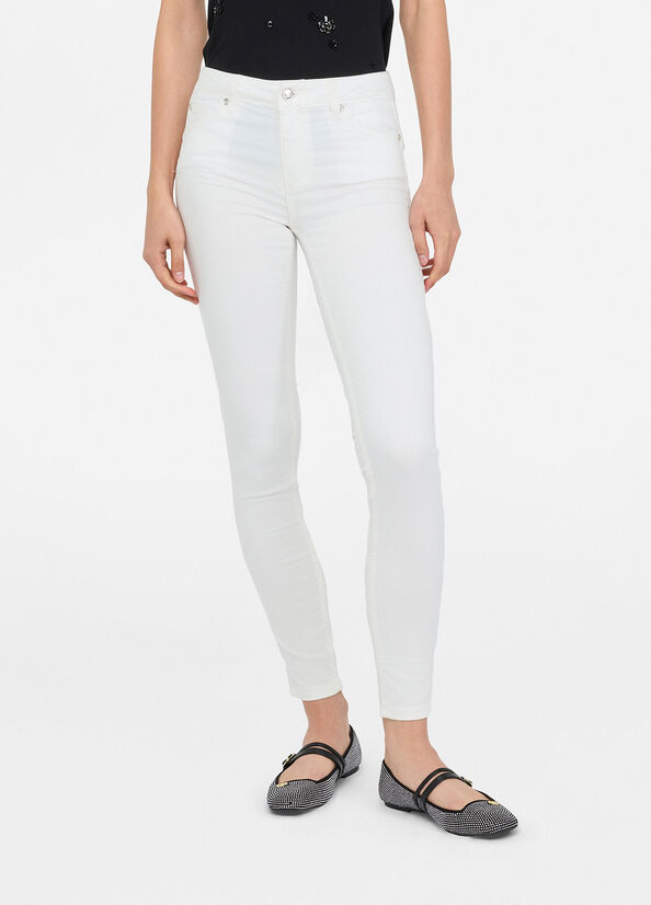 Pantaloni skinny a vita alta