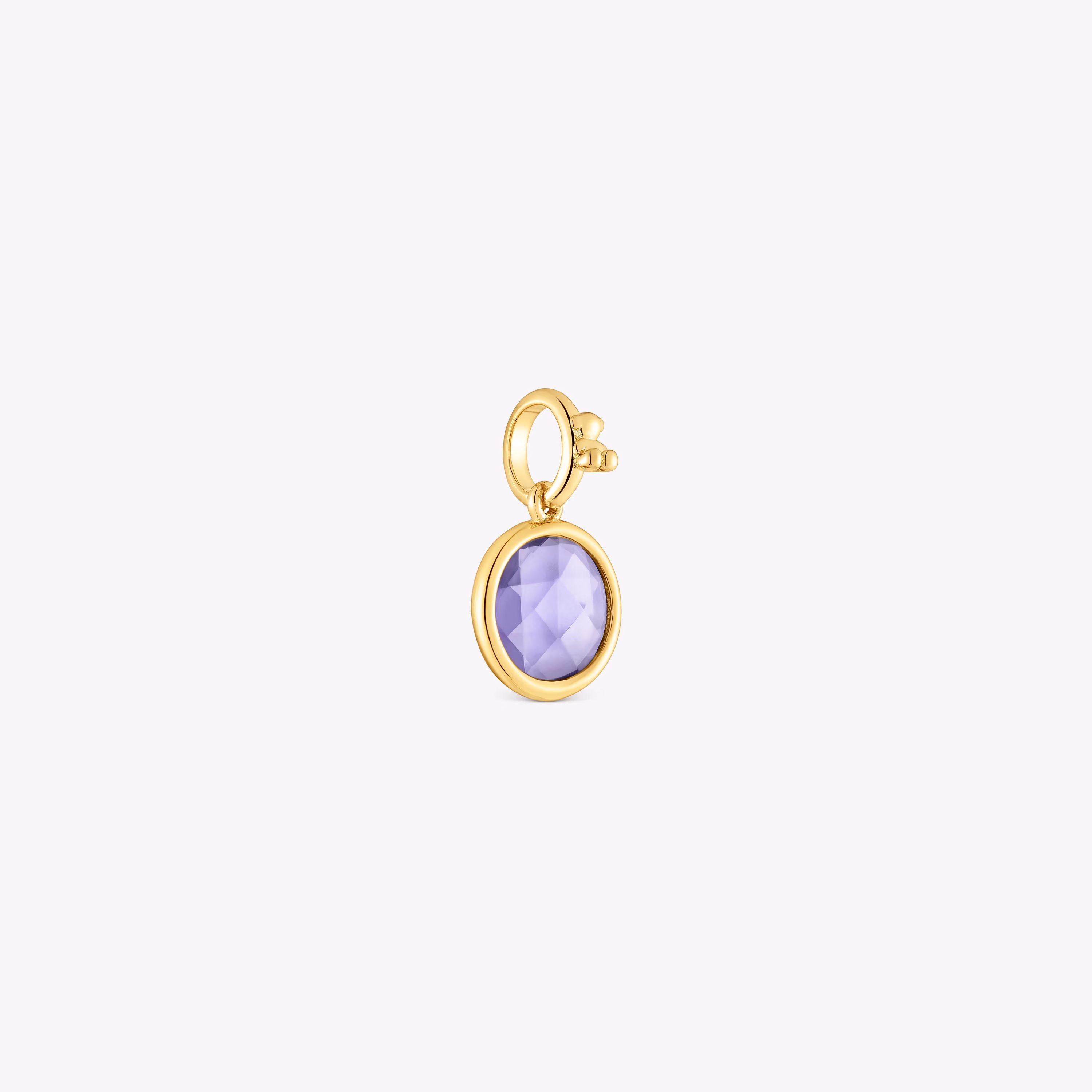 Colgante pequeño con baño de oro 18 kt sobre plata y iolita Medallions
