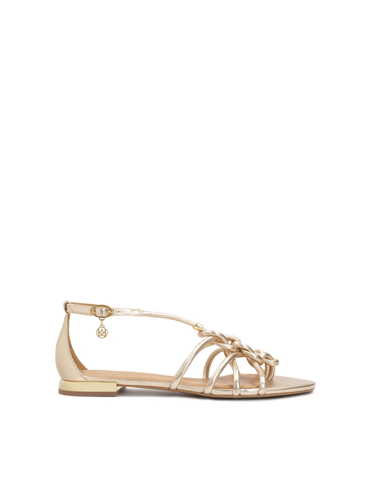 Gold flip flop sandals with intertwined straps