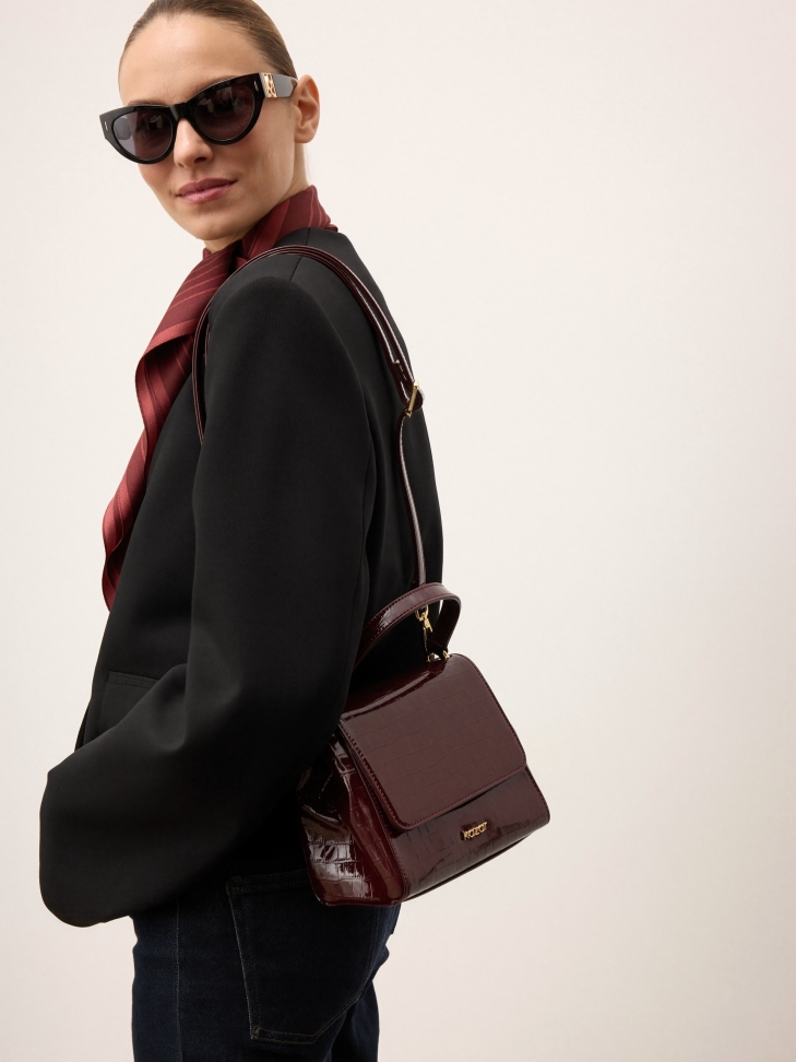 Maroon patent leather handbag