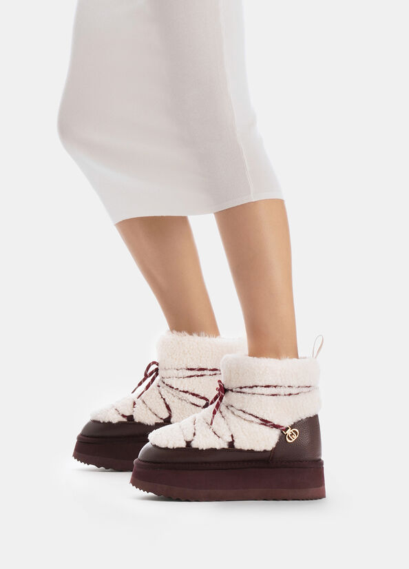 Stivaletti warm stringati