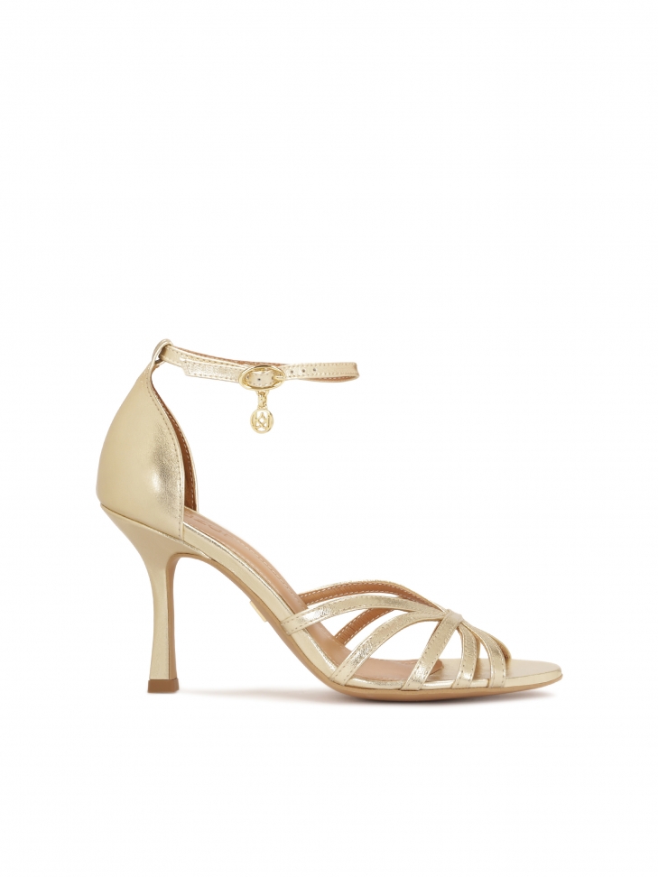 Gold sandals with built-in heels
