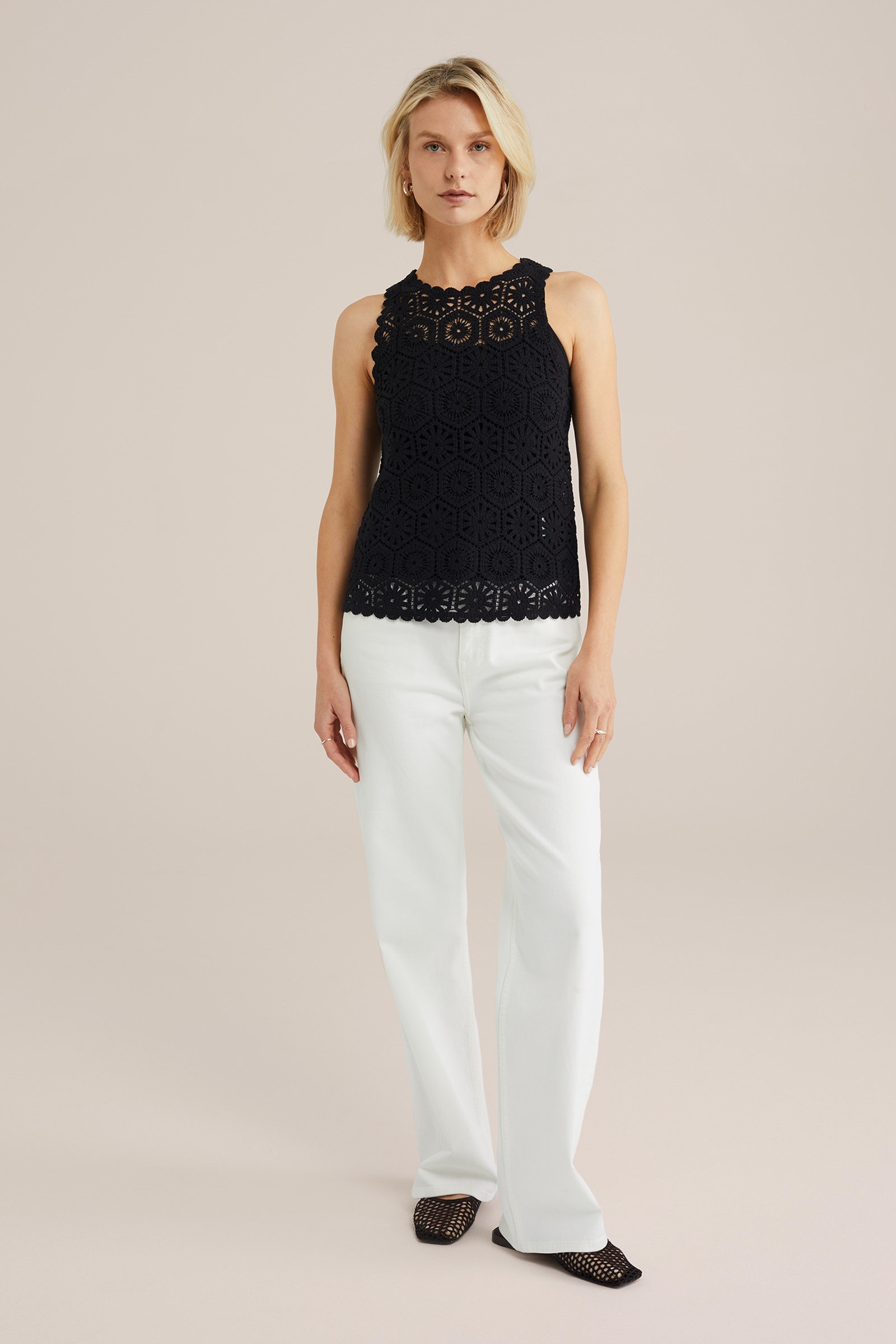 Dames gebreide top met opengewerkte structuur