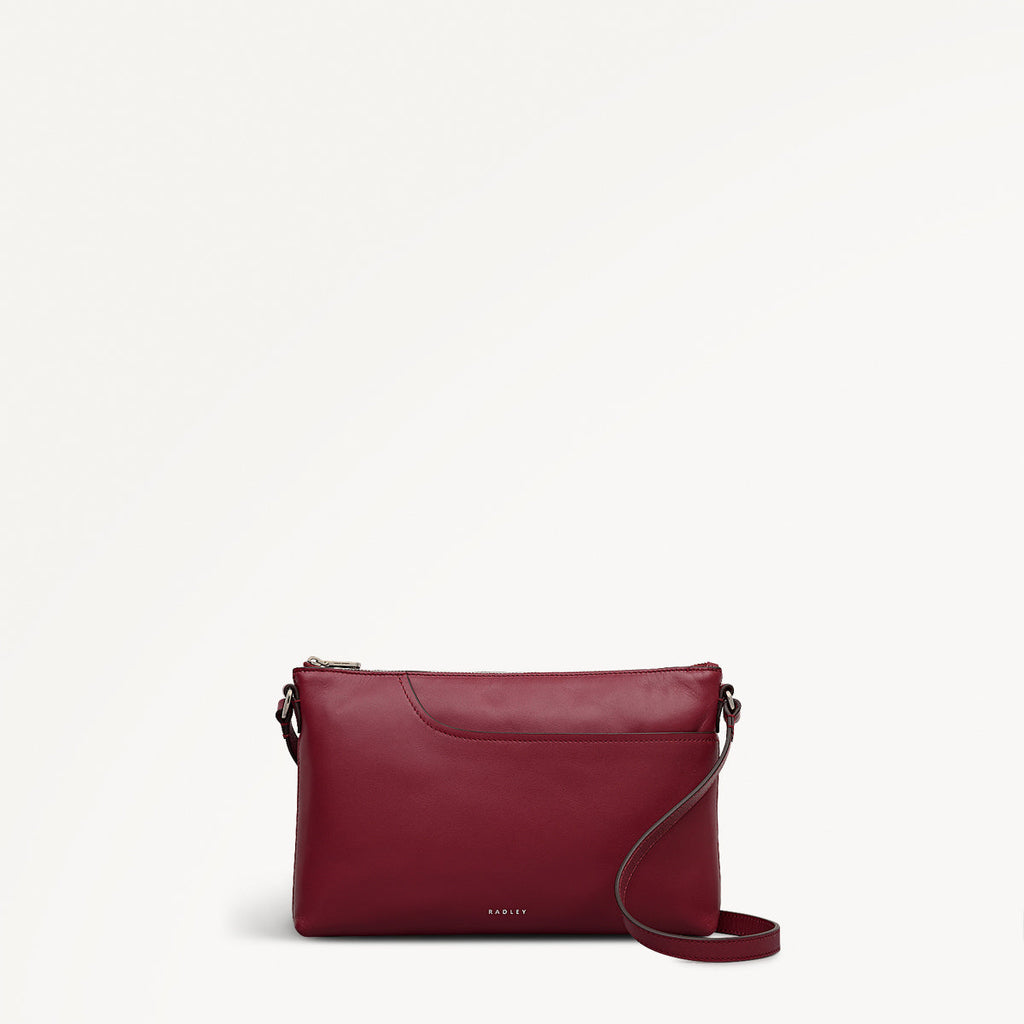 Pockets - Medium Ziptop East-West Cross Body Bag